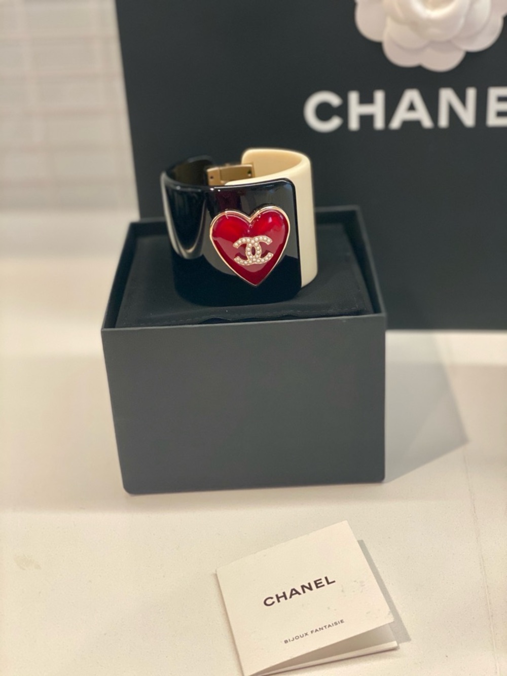 CHANEL Black and White Resin Cuff with Red Heart CC Accent - Picture 9 of 11